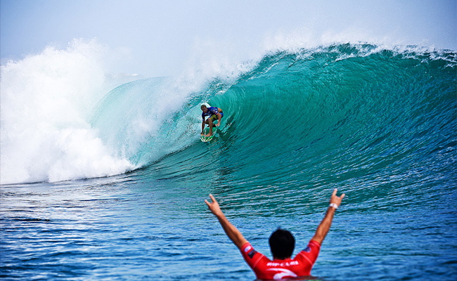 Surfer riding a wave